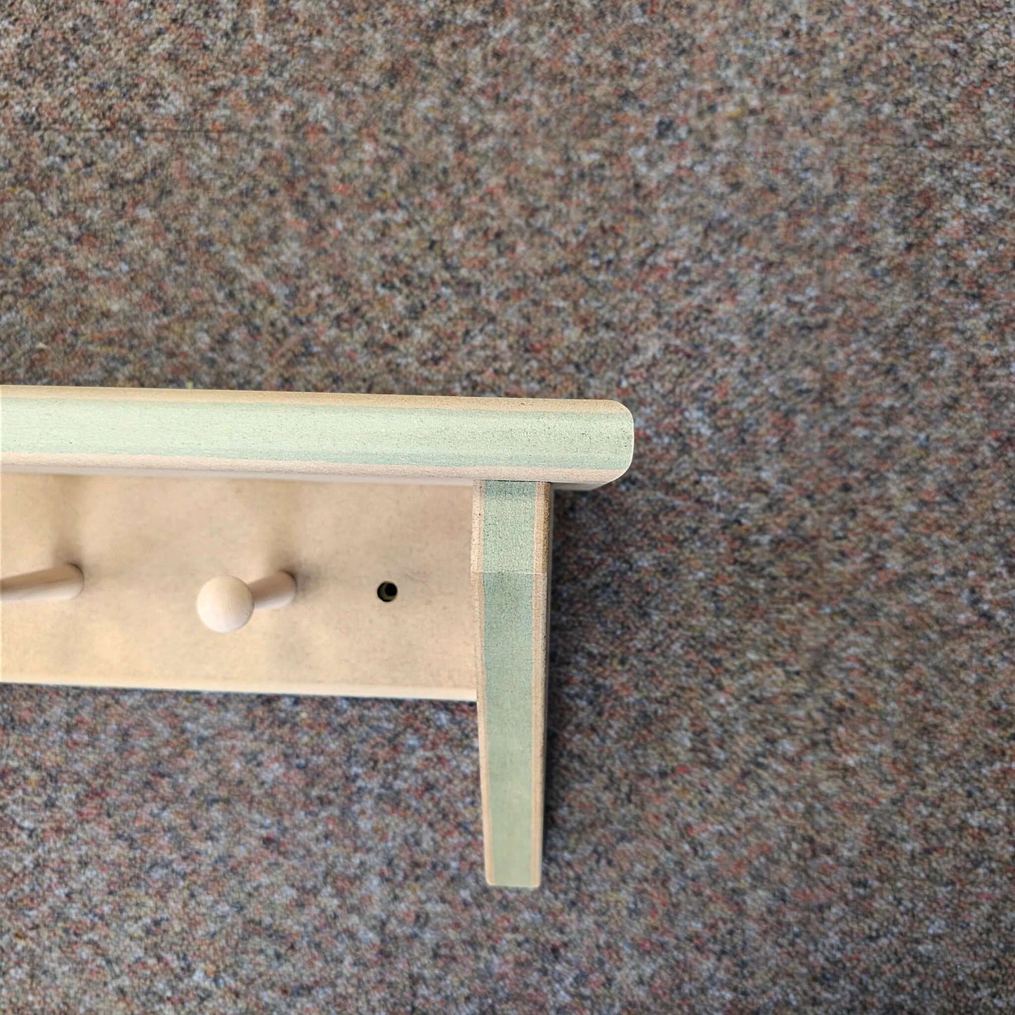 Modern Shaker Peg Shelf displayed with smooth edges and pegs, ready for customization and installation.