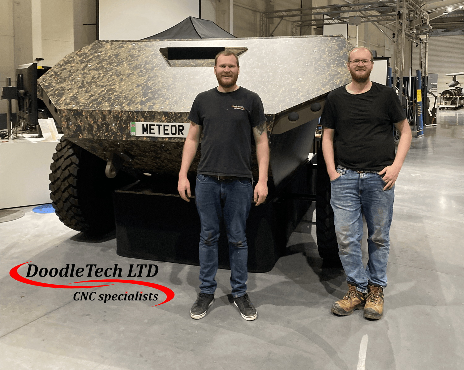 DoodleTech Ltd team beside the Meteor QinetiQ Simulator build, showcasing their custom CNC project expertise.