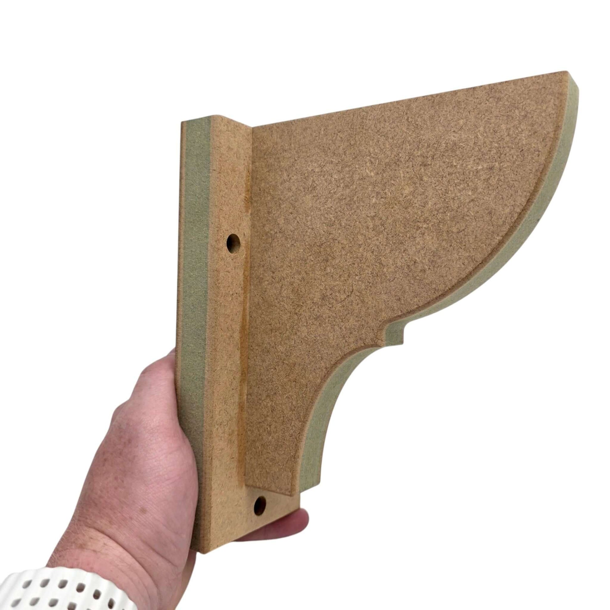 Hand holding a Shaker Gallows Bracket showcasing its clean design and premium moisture-resistant MDF material.