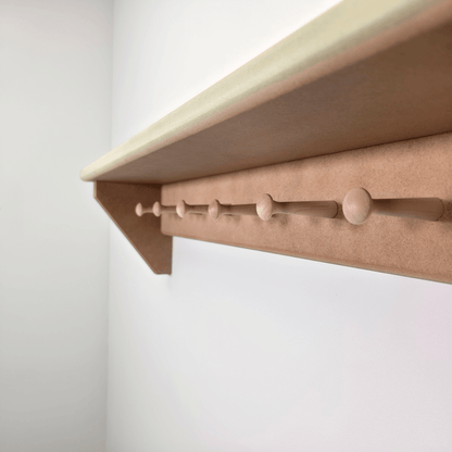 Modern Shaker Peg Shelf showcasing handmade design and peg details, perfect for hallway or nursery organization.