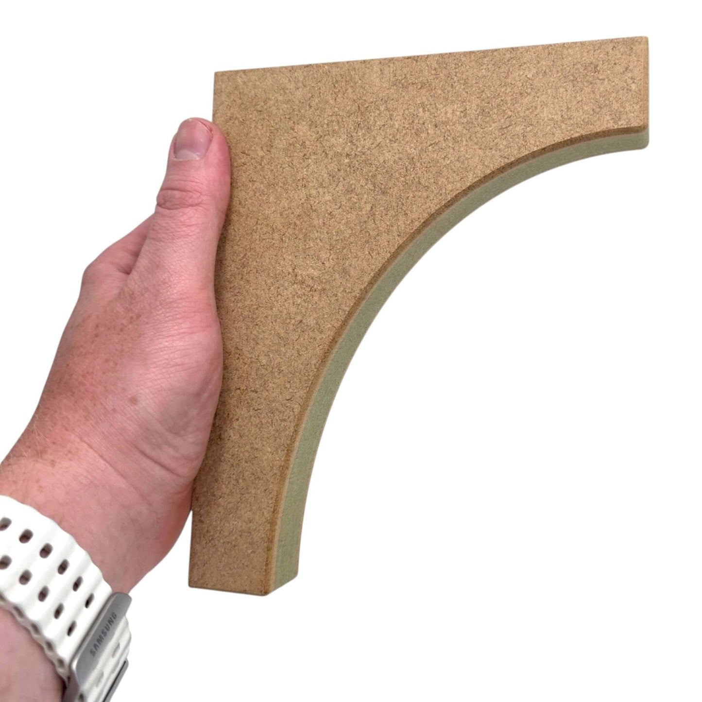 Traditional Shaker Shelf Bracket held in hand, showcasing its design and craftsmanship for country cottage styling.