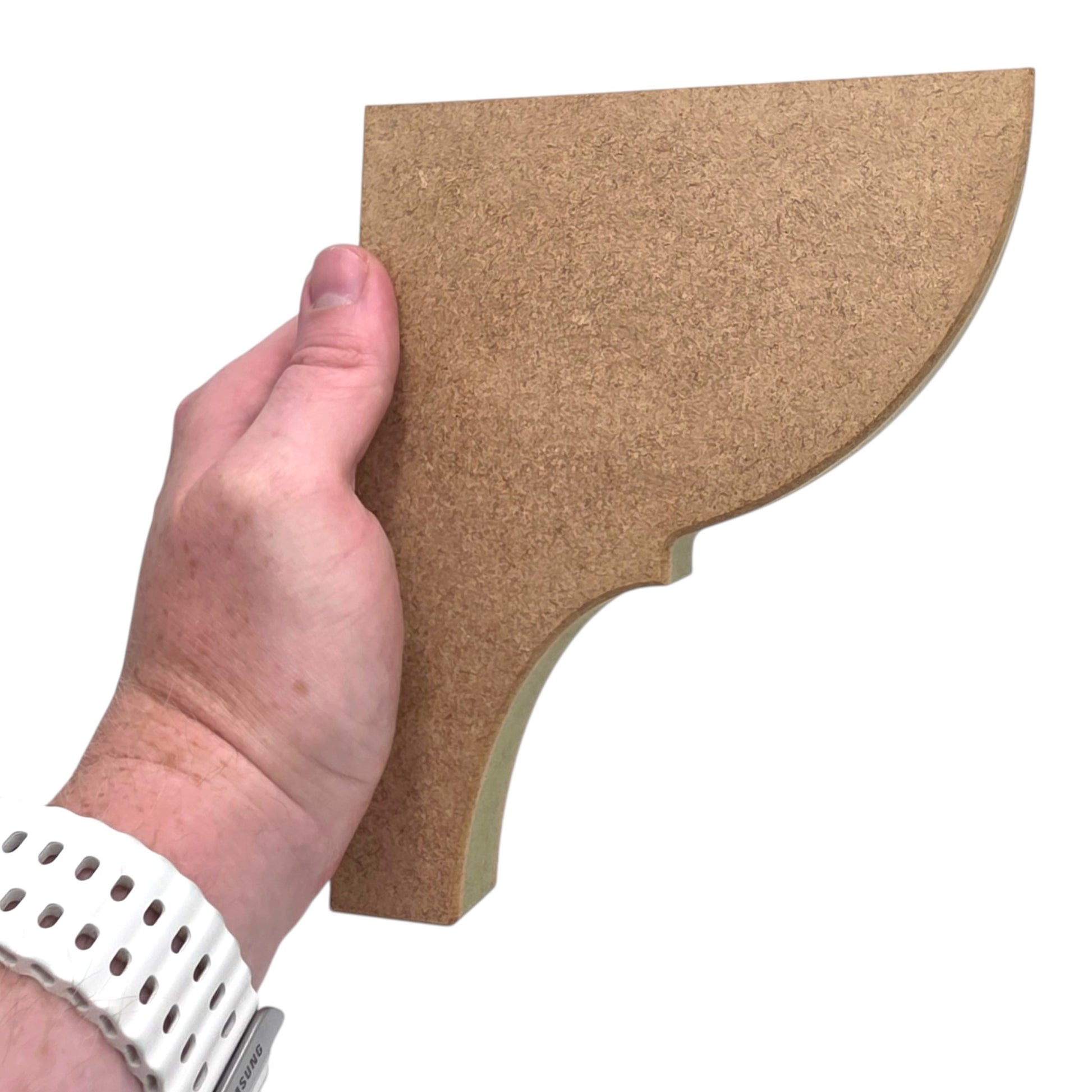 Hand holding a Traditional Shaker Shelf Bracket - Style 7 made from premium moisture-resistant MDF.