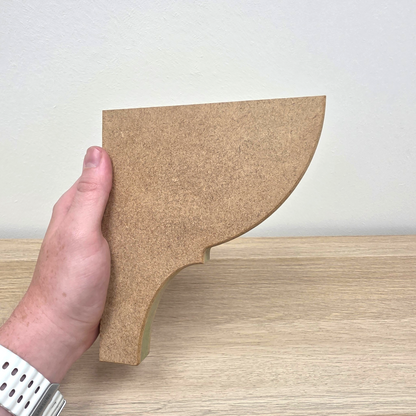Traditional Shaker Shelf Bracket held in hand, crafted from premium moisture-resistant MDF for bespoke shelving.
