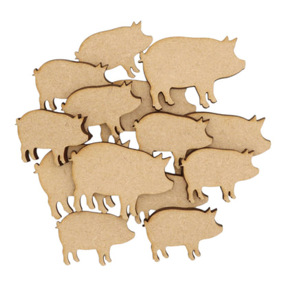 A collection of laser-cut Pig MDF Craft Shapes, perfect for farmhouse crafting and décor projects.