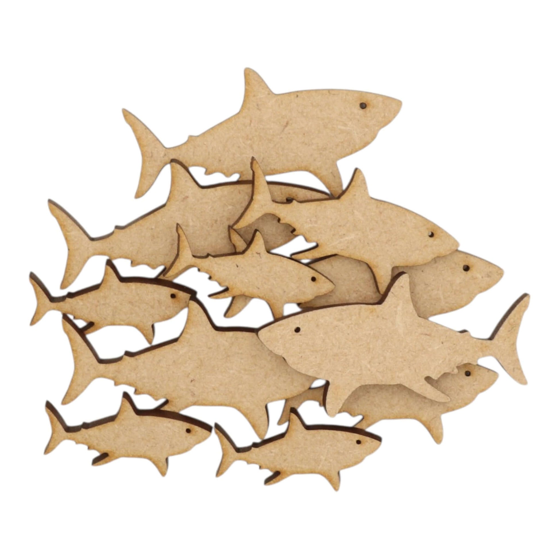 A collection of Shark MDF Craft Shapes featuring various sizes and silhouettes, perfect for crafting and ocean-themed decor.