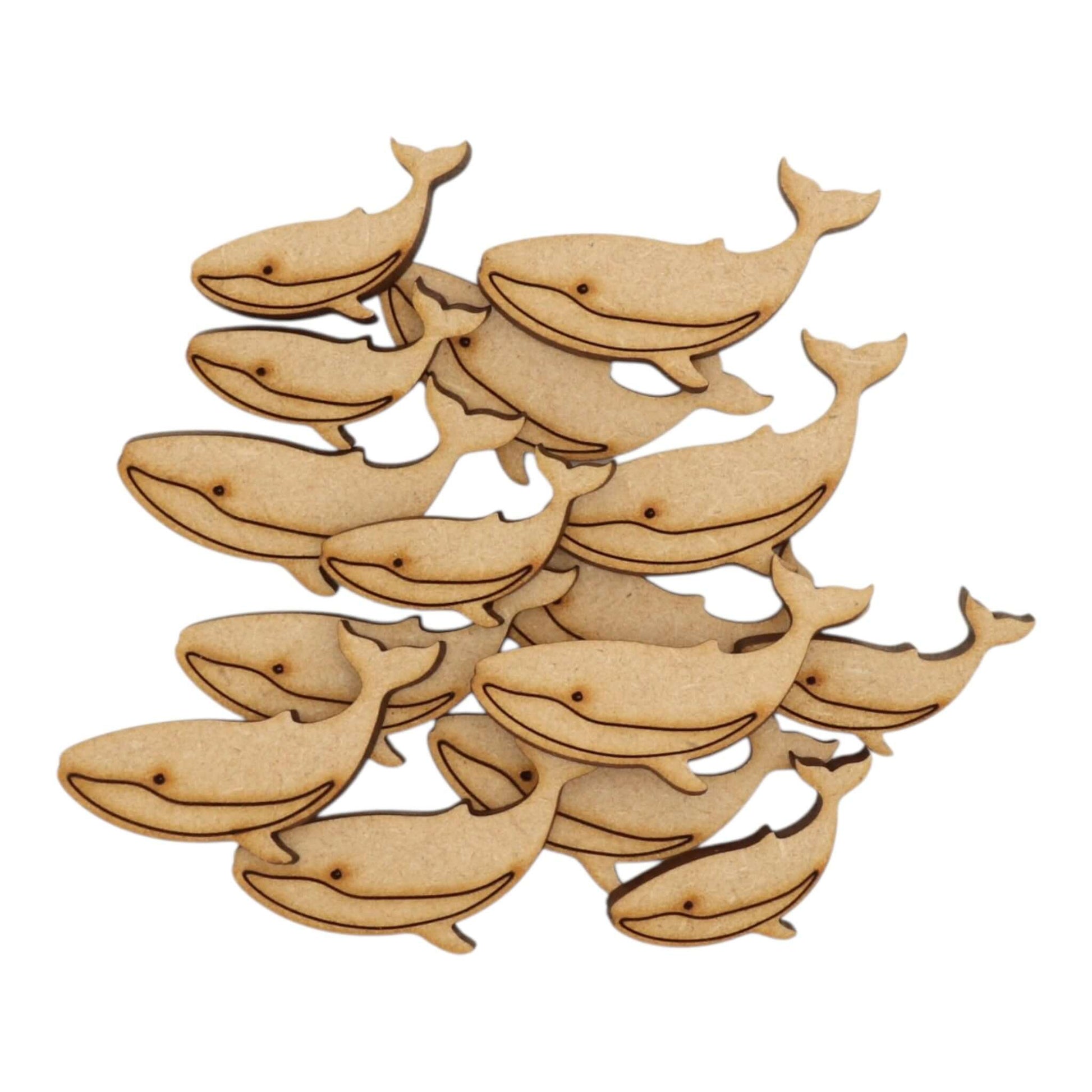 Whale MDF Craft Shape - Set of laser-cut whale shapes with engraved details, perfect for crafts and ocean-themed projects.